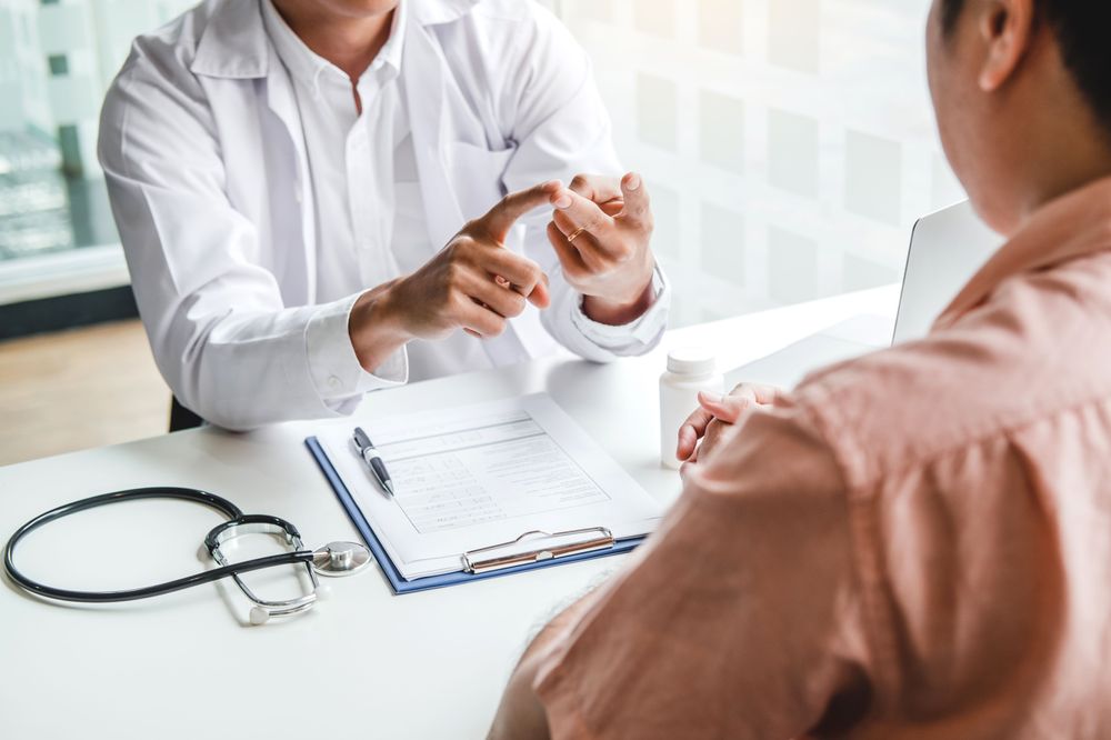 Doctor discusses treatment plan with the patient.